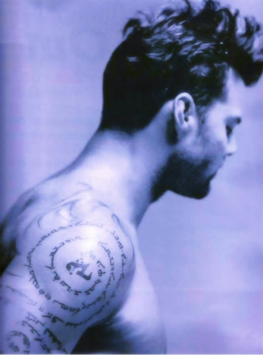  his Assyrian Aramaic Lord's Prayer tattoo in a promotional photo.